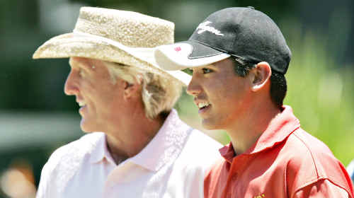 Greg Norman and Jason Day get to know each other during a practice round at Coolum. Greg Norman and Jason Day get to know each other during a practice round at Coolum.